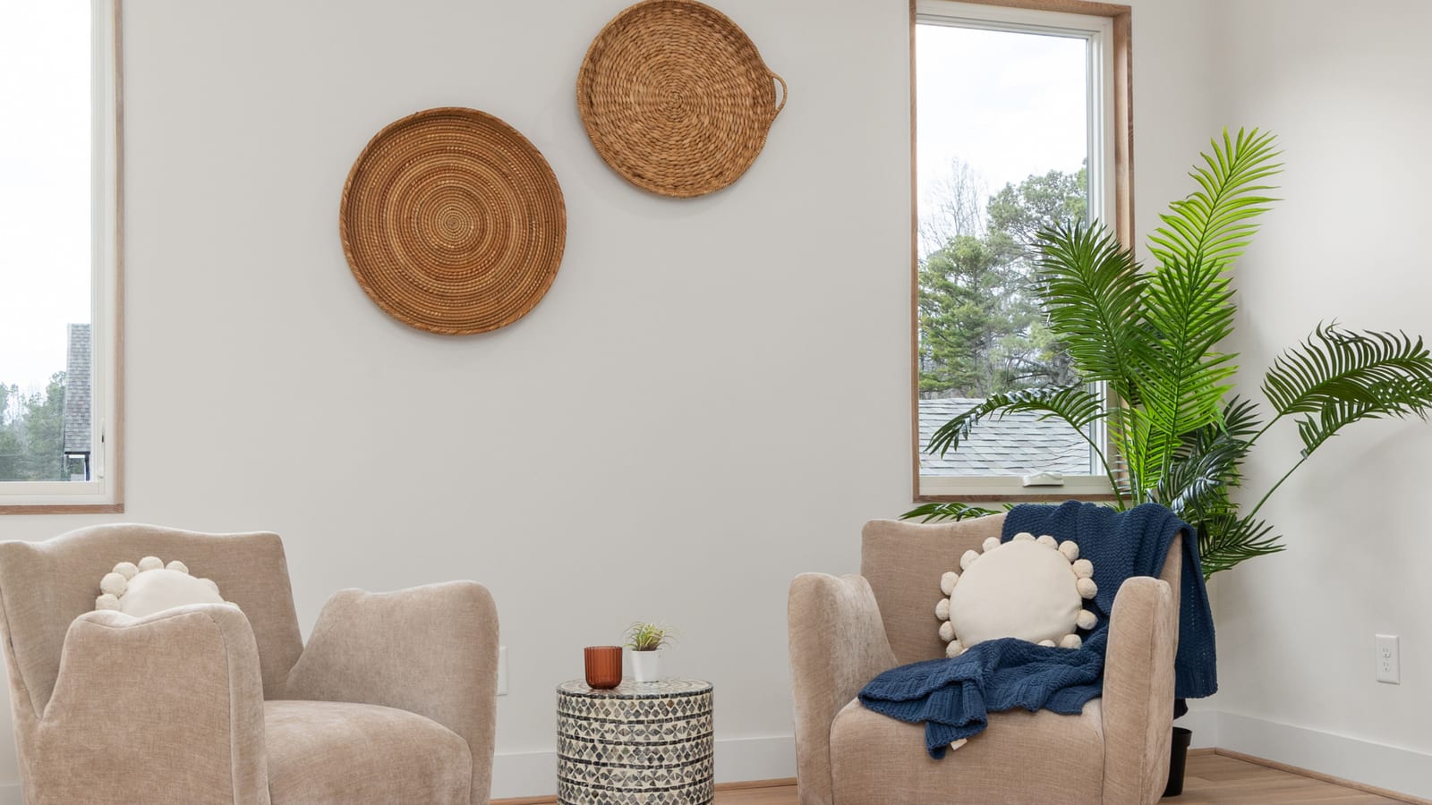 Calm, softly lit sitting area with linen furnishings and a potted plant — weight loss and mental health at OC Weight Loss &