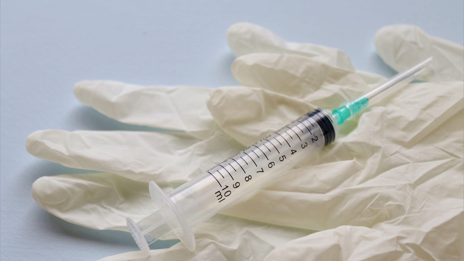 Fine syringe and glass vial on a stainless tray — b12 fat-burning injections at OC Weight Loss & Med Spa, Mission Viejo