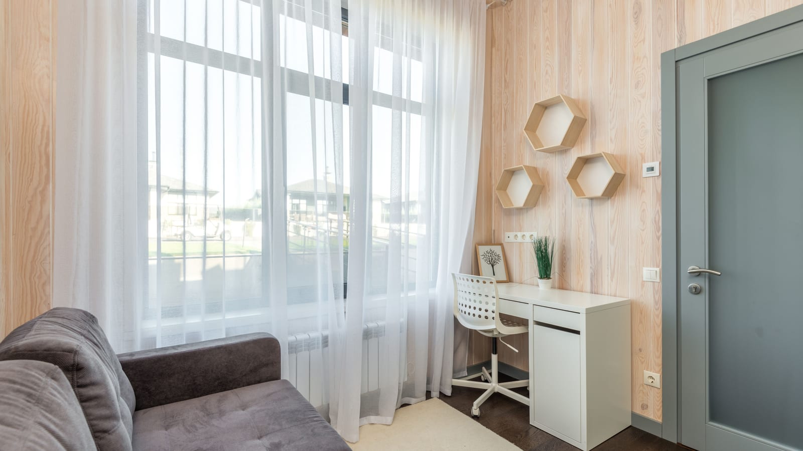 Clinician’s consultation room with a desk and window light — hormone replacement therapy at OC Weight Loss & Med Spa