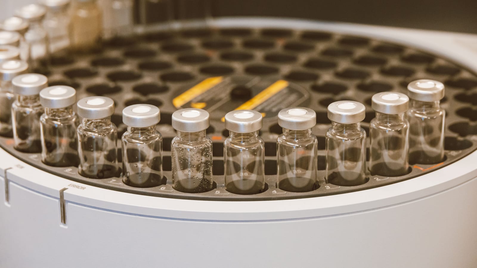 Fine syringe and glass vial on a stainless tray — lipotropic fat-burning injections at OC Weight Loss & Med Spa, Mission