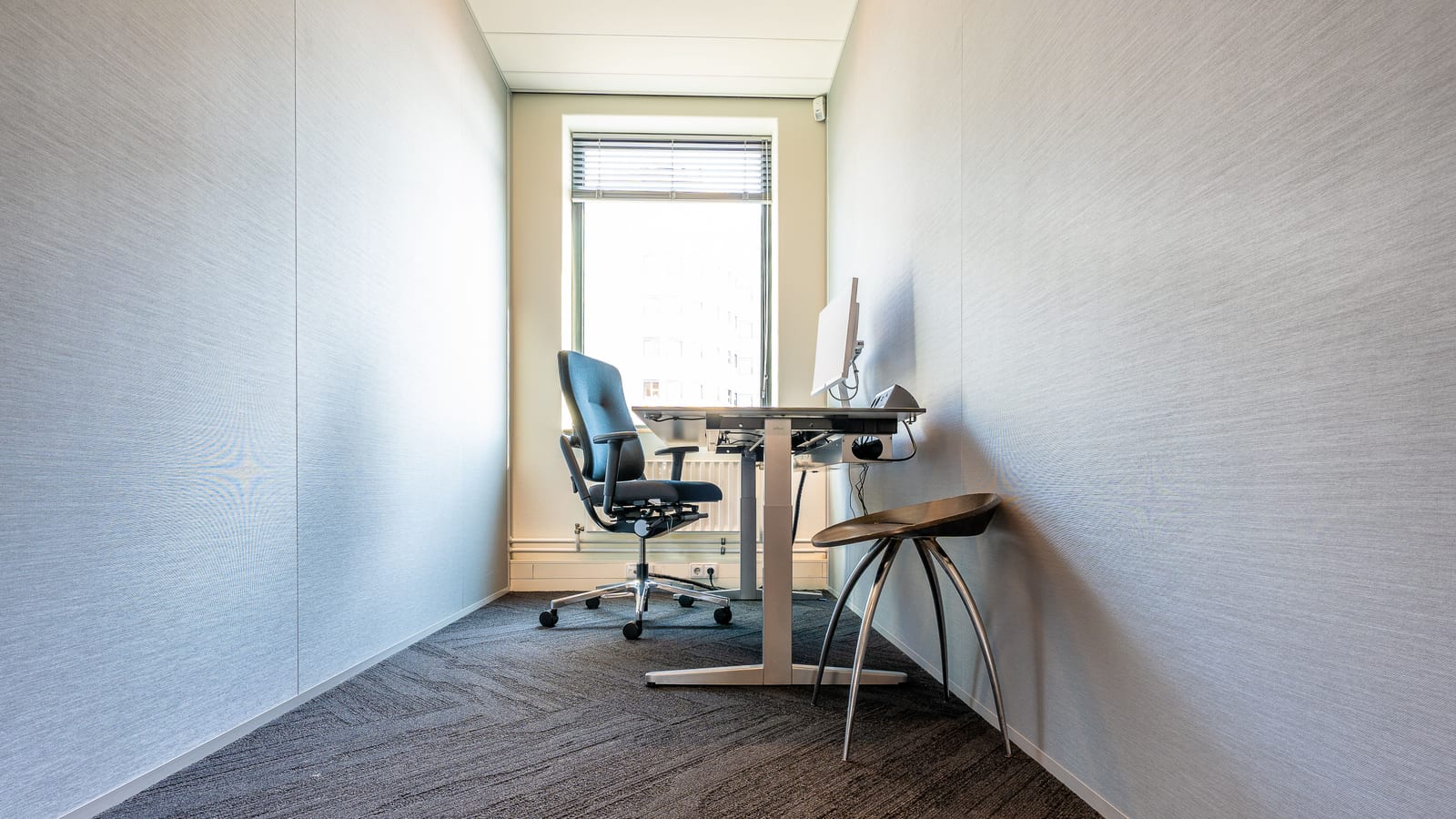 Clinician’s consultation room with a desk and window light — bioidentical hormone pellets cost at OC Weight Loss & Med Spa