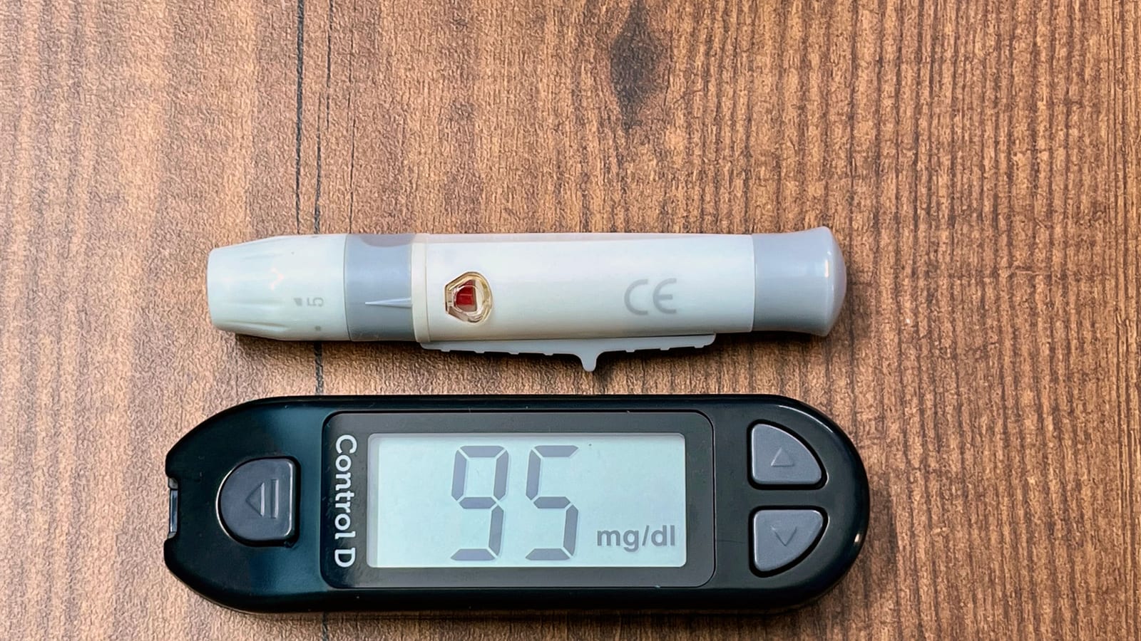 Pen injector on a clean, pale surface — 5 tips for maintaining weight loss after semaglutide at OC Weight Loss & Med Spa