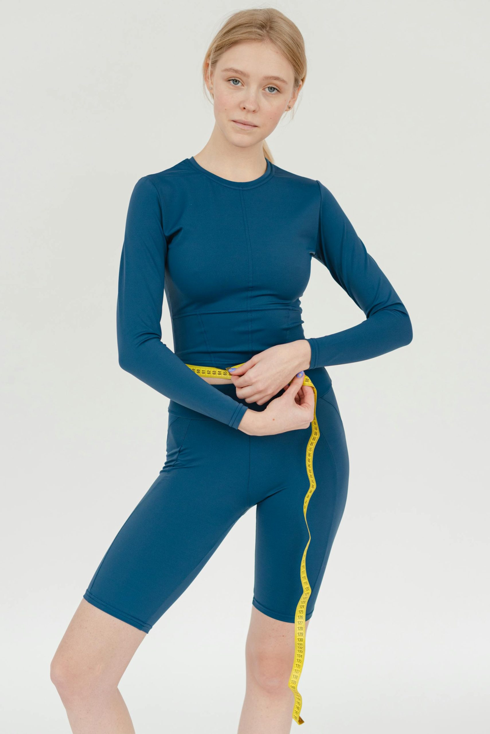 Measuring waist circumference — tracking body composition on a medically supervised weight-loss plan