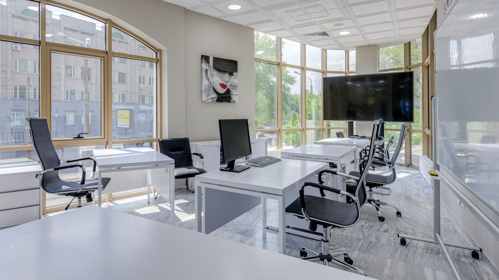 Clinician’s consultation room with a desk and window light — hrt in laguna niguel at OC Weight Loss & Med Spa, Mission Viejo