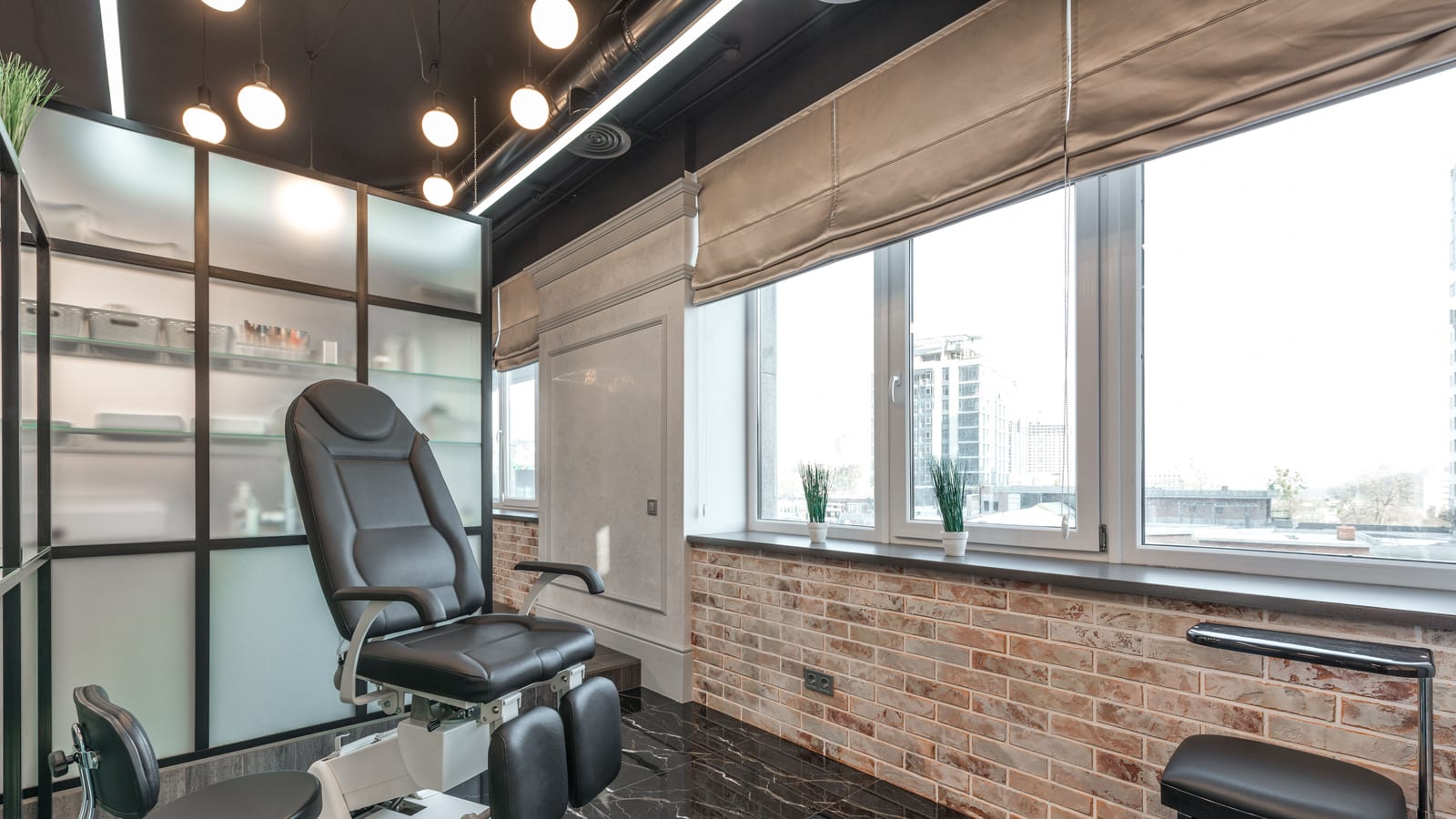 Serene med spa treatment room with a linen-draped bed and a large window — benefits of losing weight at OC Weight Loss & Med