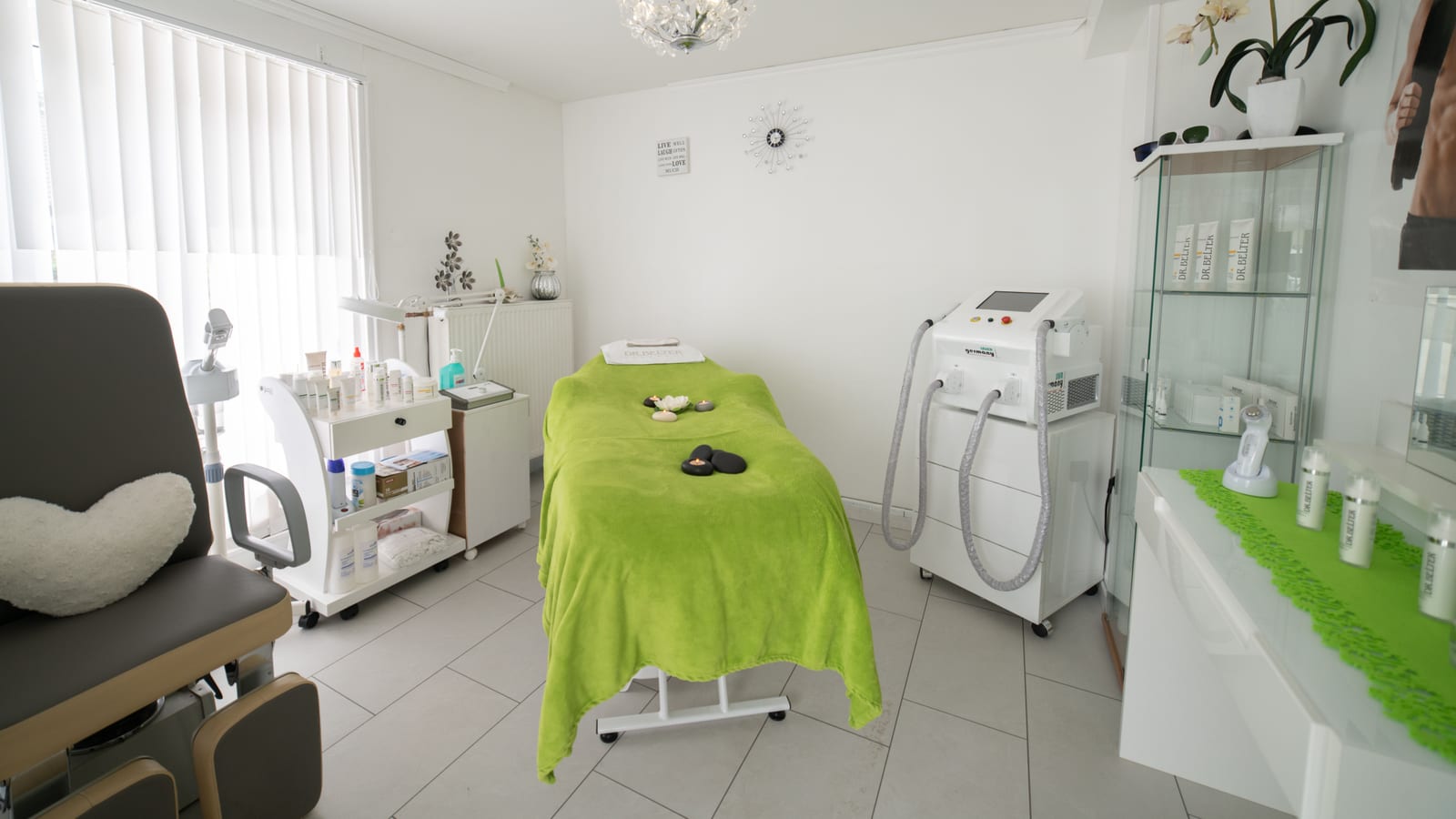 Serene med spa treatment room with a linen-draped bed and a large window — body composition and professional performance at