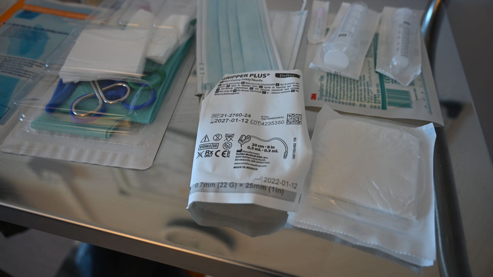 Syringe and cannula on a sterile field in a clinic — lip filler in rancho santa margarita at OC Weight Loss & Med Spa