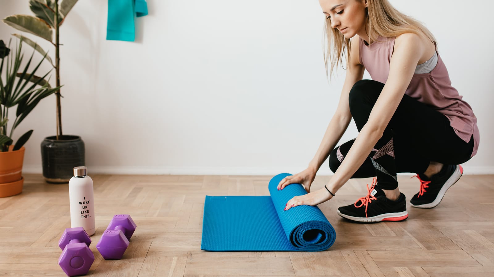 Exercise mat, dumbbell and folded towel in a bright, minimal room — low testosterone and trt at OC Weight Loss & Med Spa