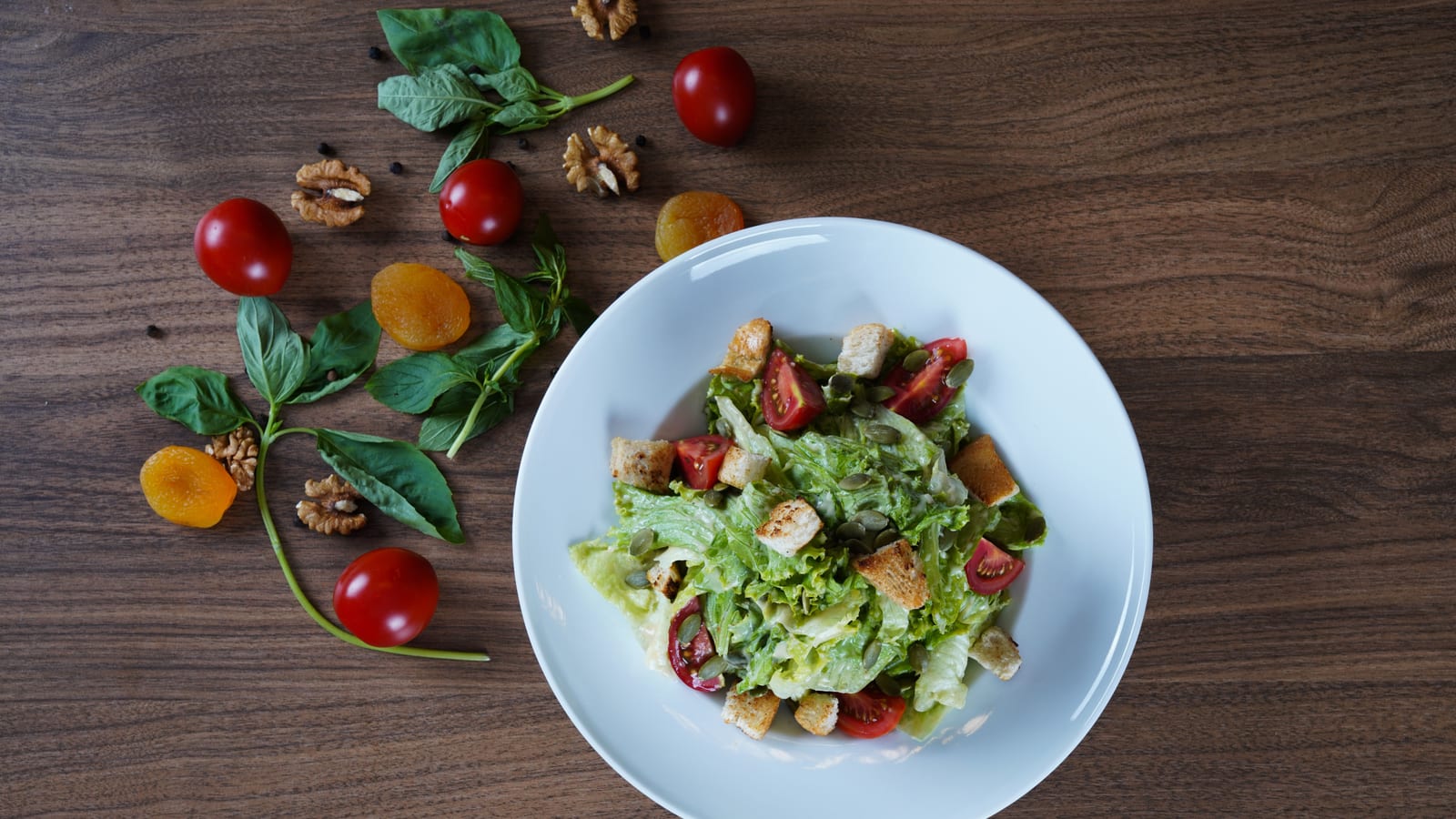 Fresh vegetables and a prepared salad bowl on a wooden table — medical diet programs for weight loss at OC Weight Loss & Med