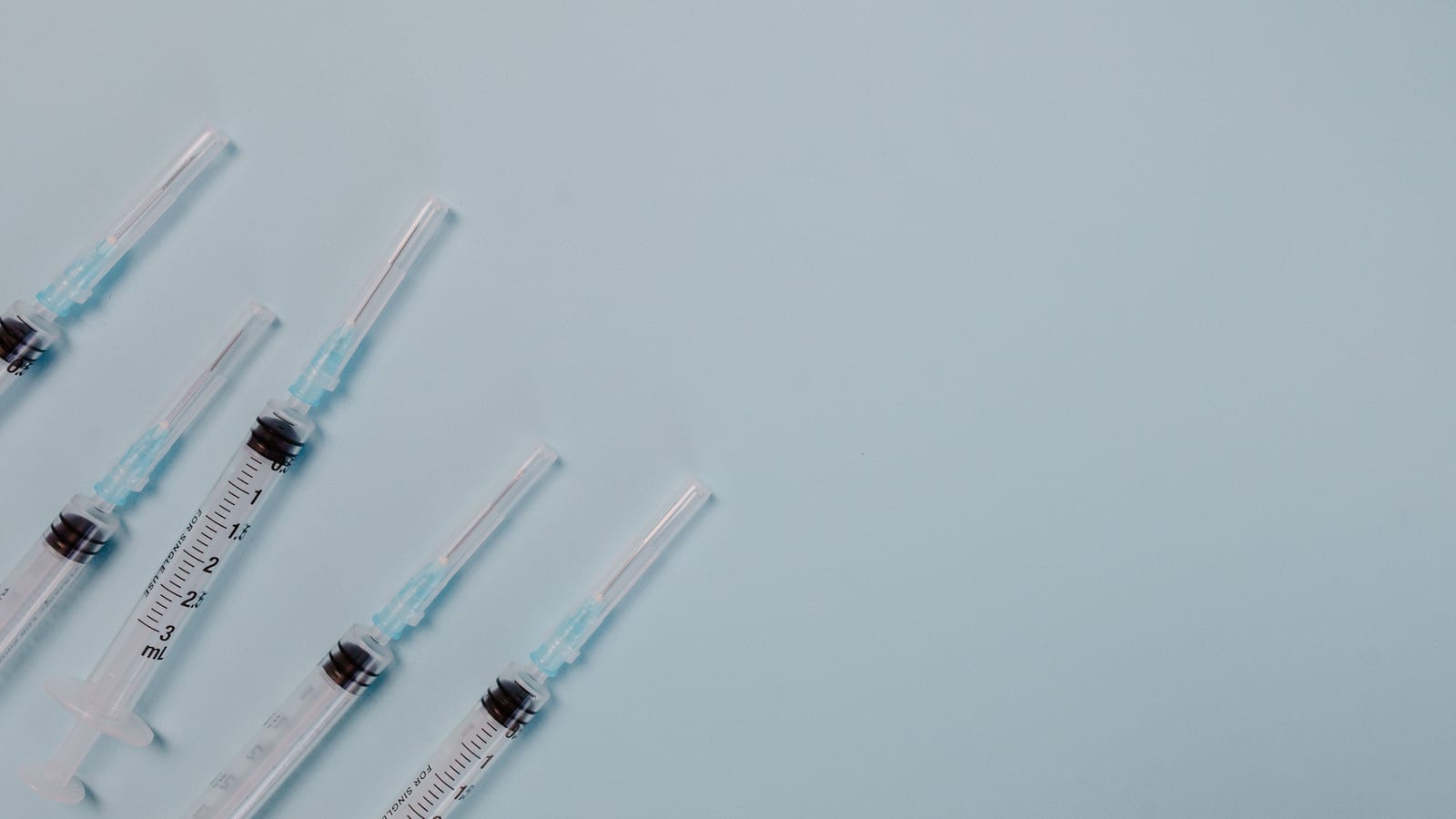 Fine syringe and glass vial on a stainless tray — medical weight loss injections guide at OC Weight Loss & Med Spa, Mission