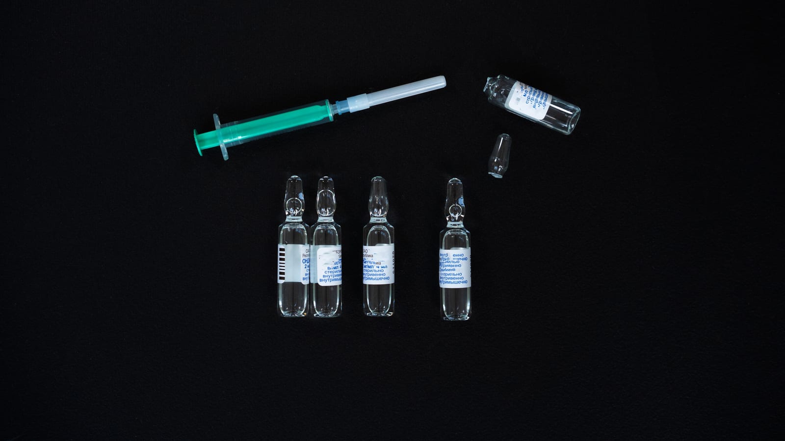 Single-dose injector pen and alcohol swabs on a pale surface — mounjaro dosage chart for weight loss at OC Weight Loss & Med