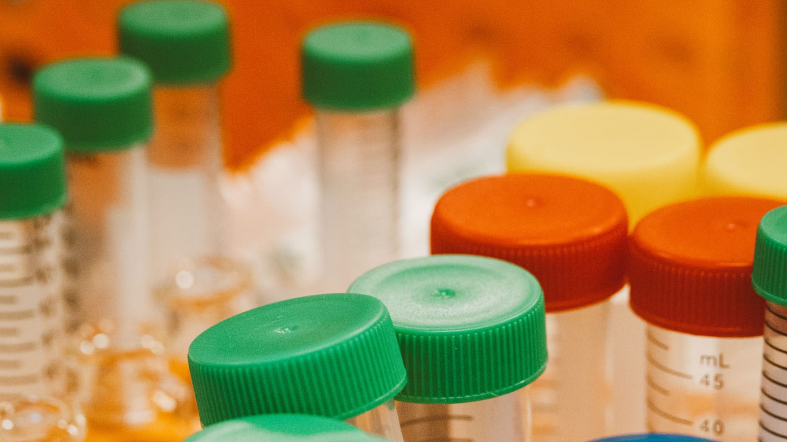 Small glass vials in a tray on a clean counter — nad+ therapy in irvine at OC Weight Loss & Med Spa, Mission Viejo