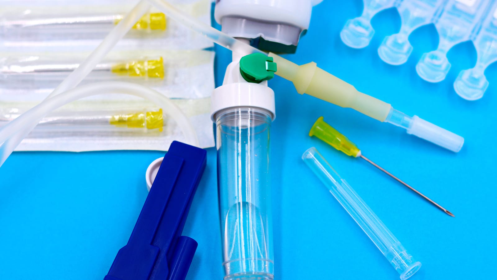 Syringe and cannula on a sterile field in a clinic — nasolabial fold filler at OC Weight Loss & Med Spa, Mission Viejo