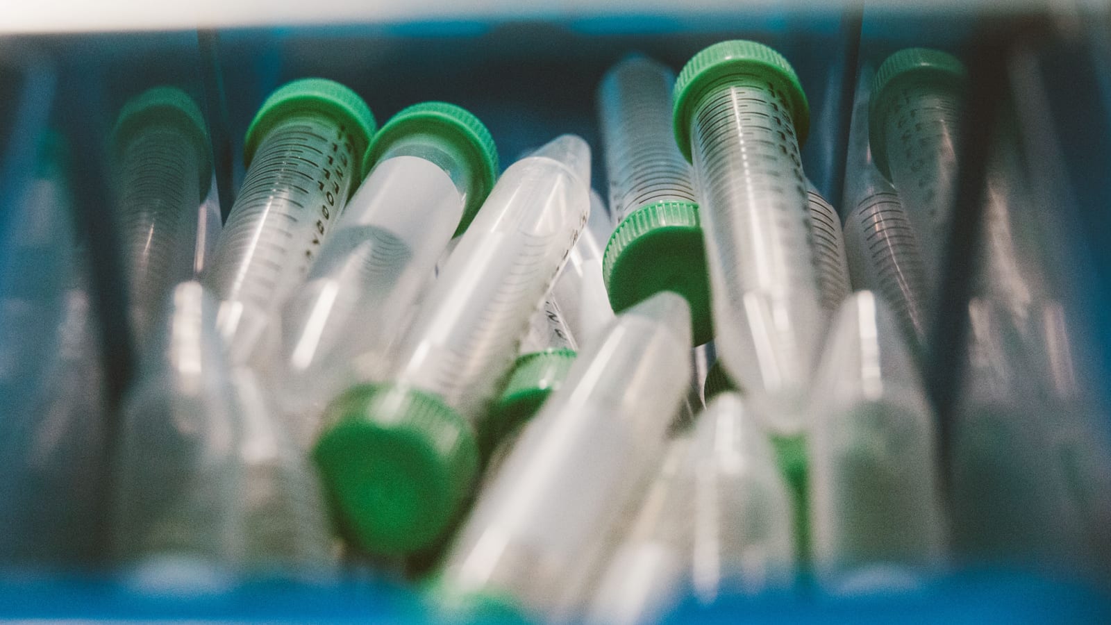Small glass vials in a tray on a clean counter — peptides for weight loss at OC Weight Loss & Med Spa, Mission Viejo