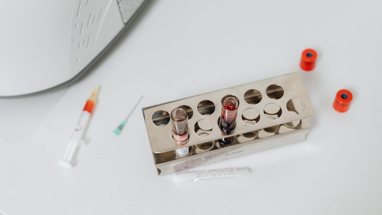 Fine syringe and glass vial on a stainless tray — phentermine for weight loss at OC Weight Loss & Med Spa, Mission Viejo