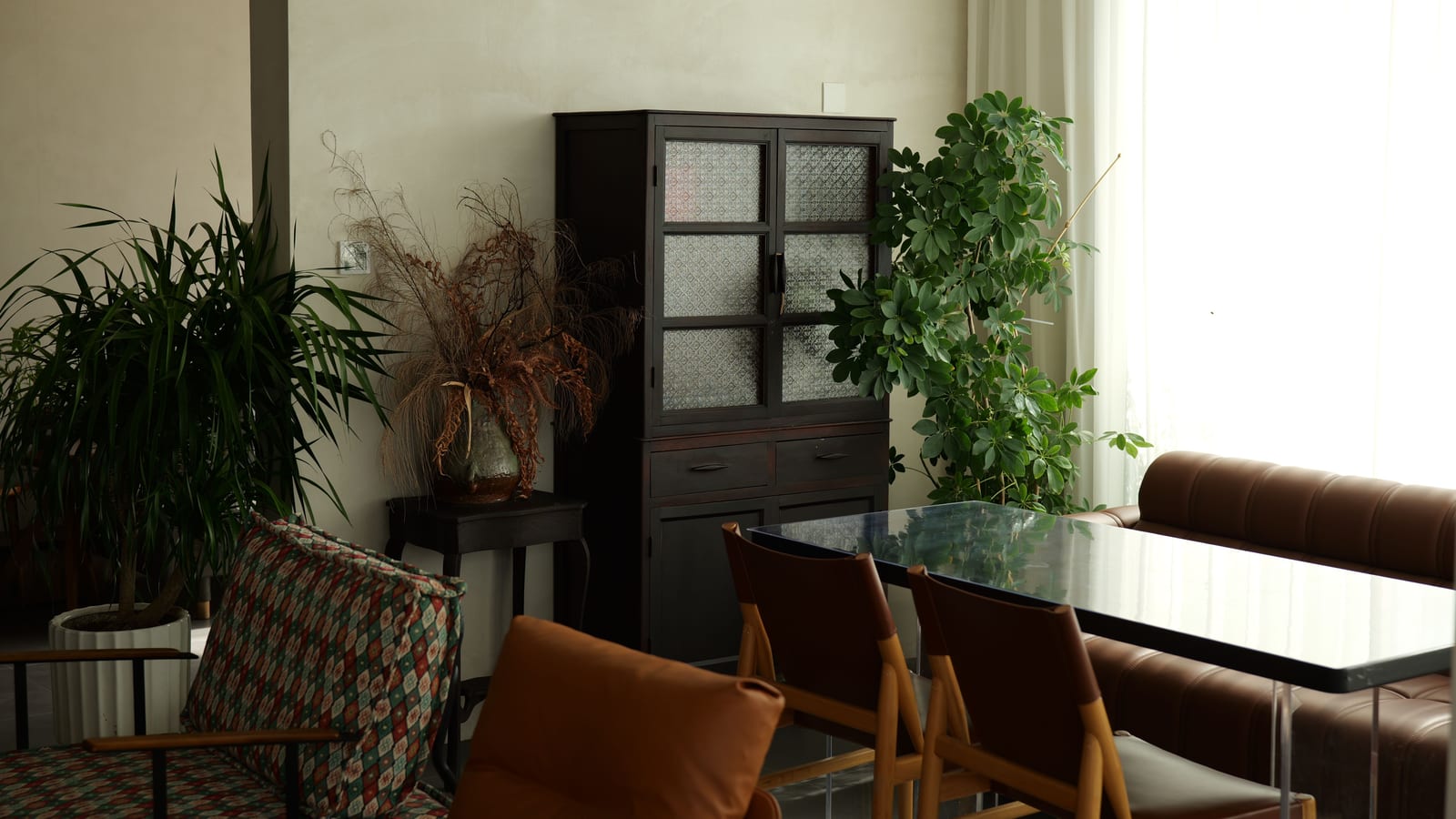 Calm, softly lit sitting area with linen furnishings and a potted plant — sermorelin for sleep at OC Weight Loss & Med Spa