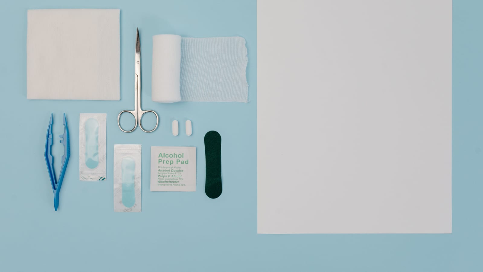 Single-dose injector pen and alcohol swabs on a pale surface — tirzepatide for weight loss at OC Weight Loss & Med Spa