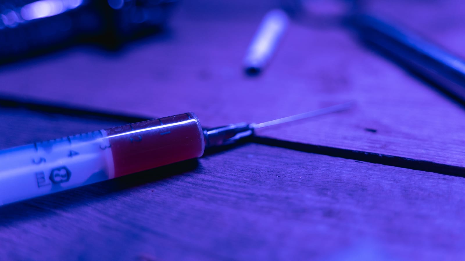 Single-dose injector pen and alcohol swabs on a pale surface — tirzepatide in costa mesa at OC Weight Loss & Med Spa