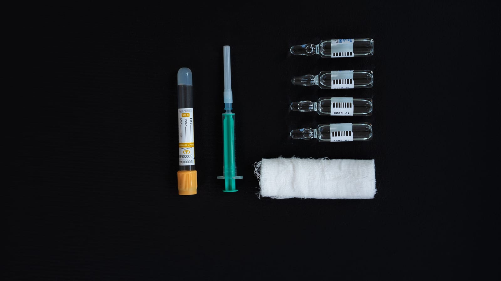 Single-dose injector pen and alcohol swabs on a pale surface — tirzepatide in newport beach at OC Weight Loss & Med Spa