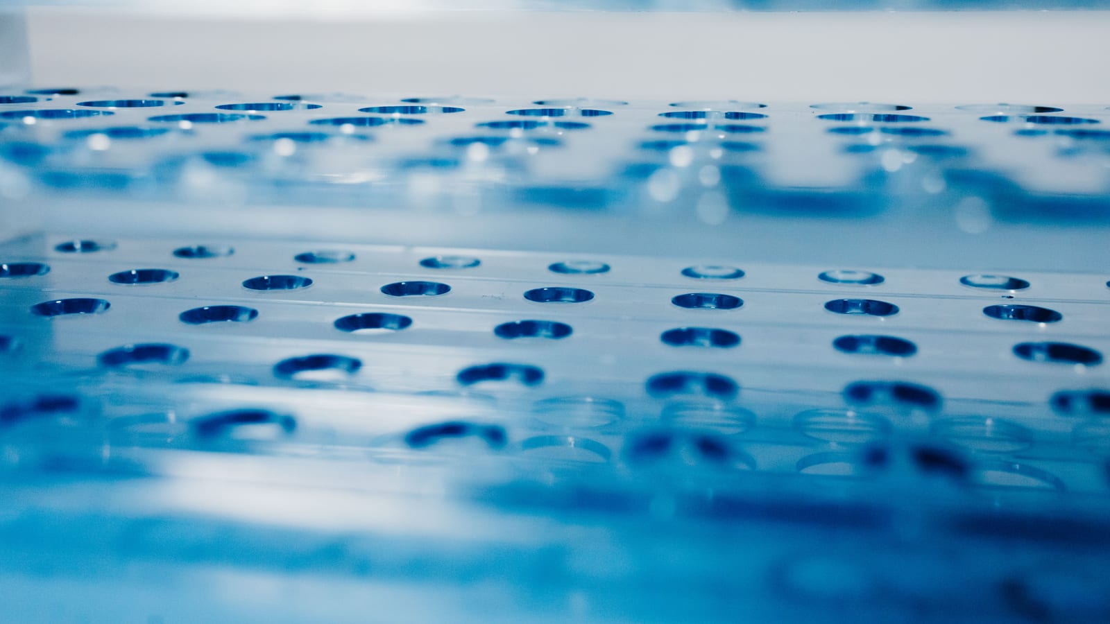 Small glass vials in a tray on a clean counter — what is bpc-157? educational guide to the peptide at OC Weight Loss & Med
